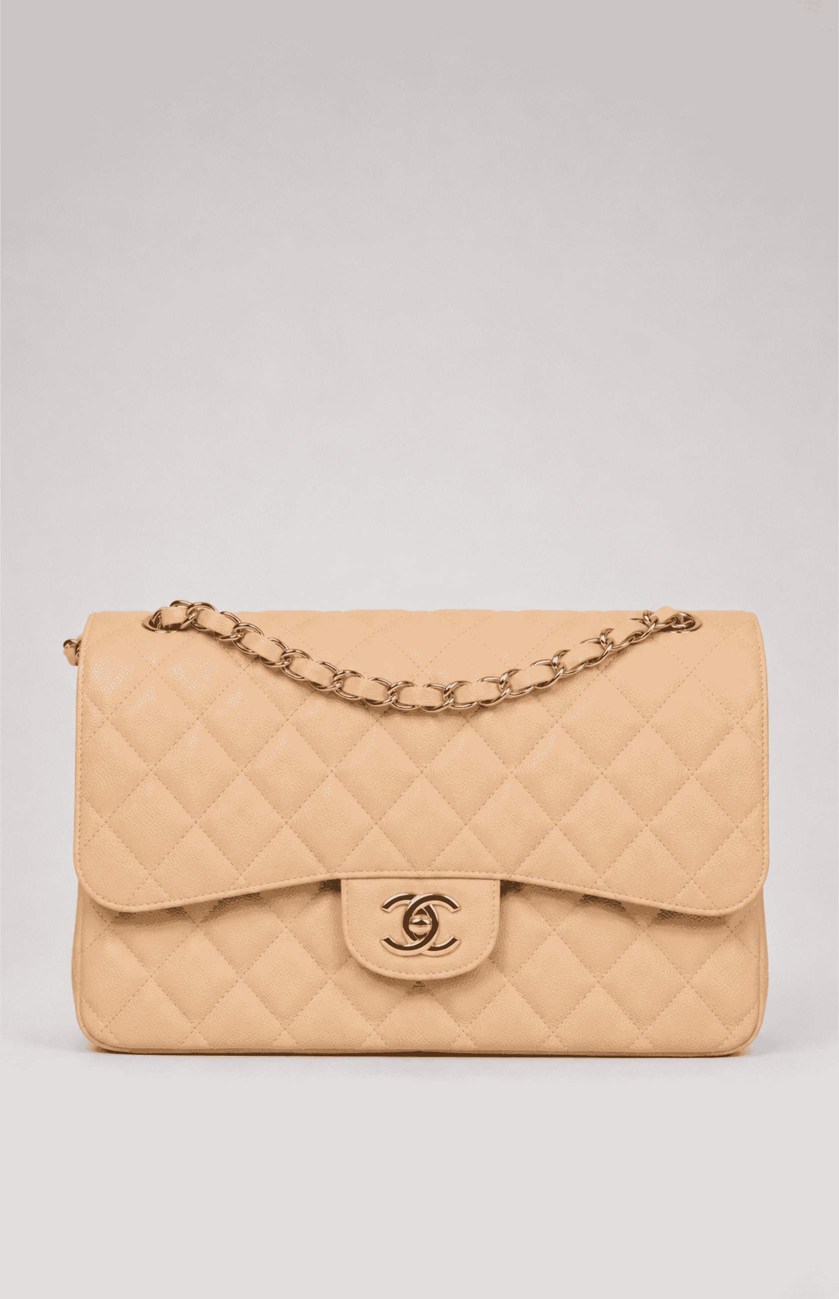 Chanel Jumbo Classic Double Flap Bag Beige Caviar front view with gold CC closure