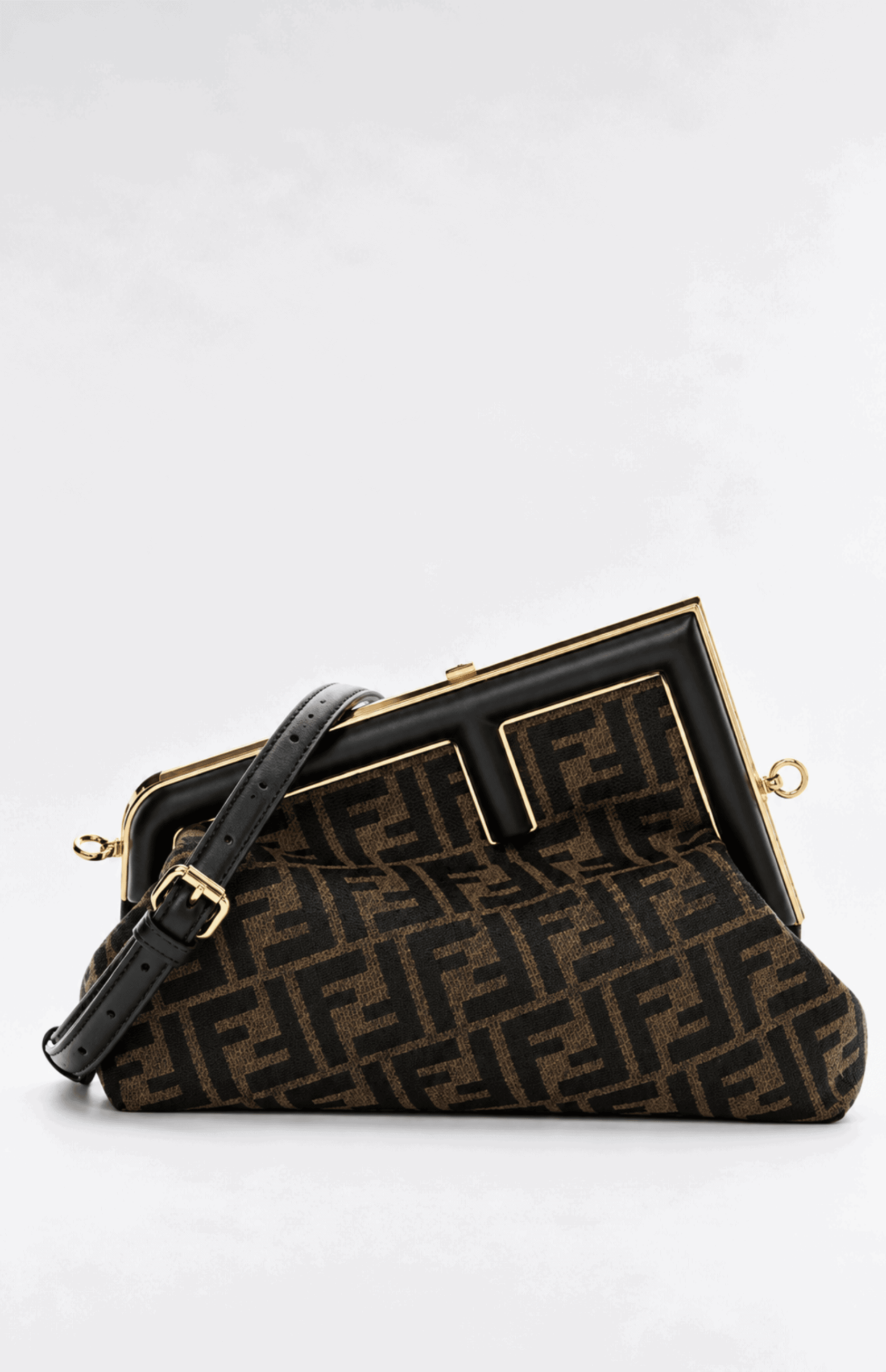 Fendi First Midi Brown FF Jacquard Fabric Bag front view with black leather trim and gold hardware